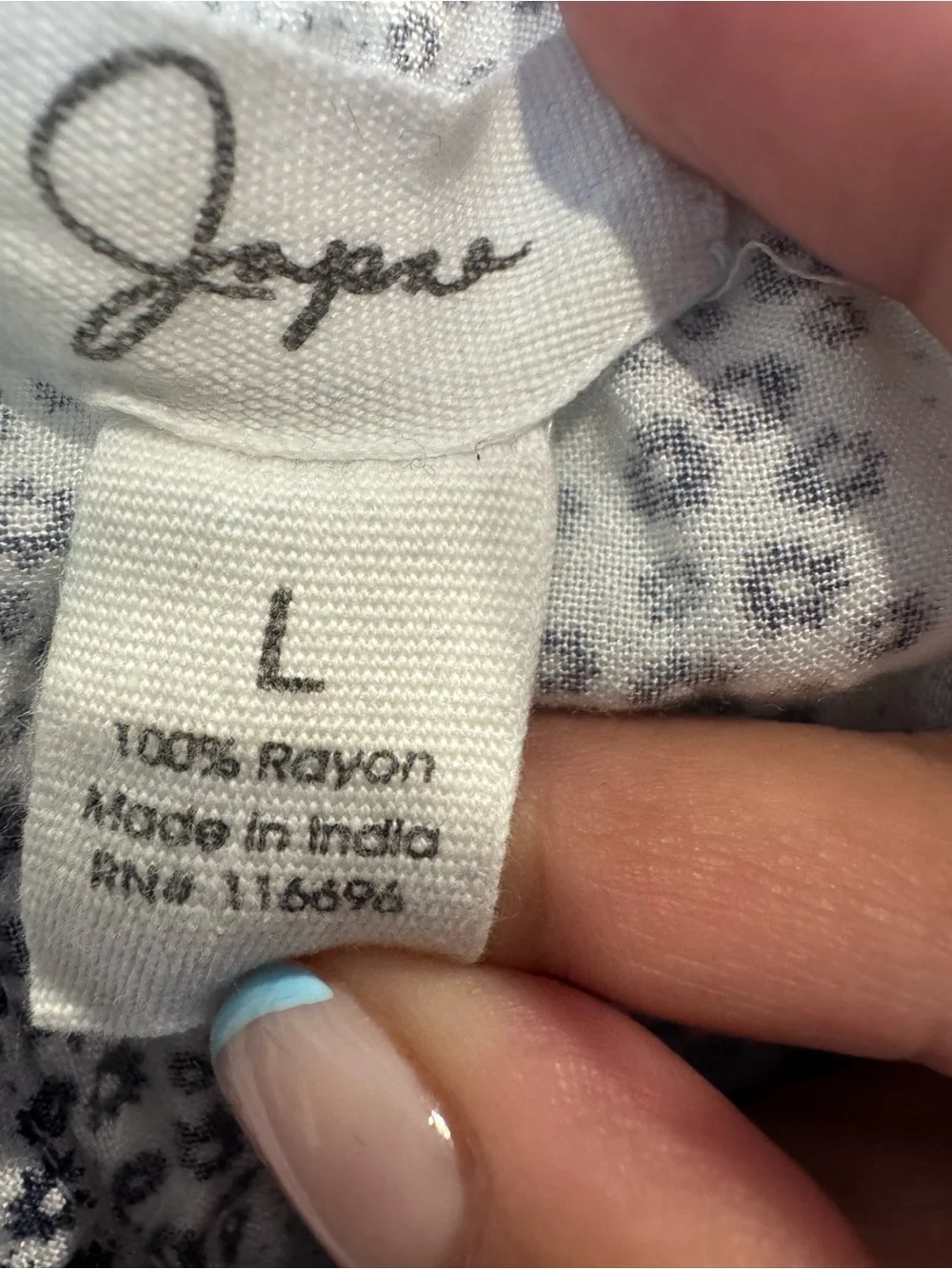 Sleeveless Blue & White Striped Smocked-Waist Jumpsuit